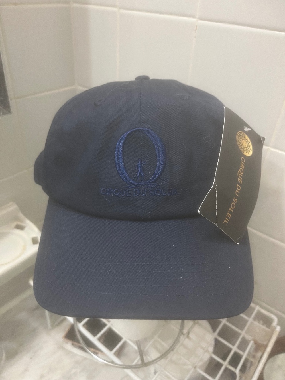 Brand new limited edition Cirque du Soleil “O” unstructured navy blue cap hat